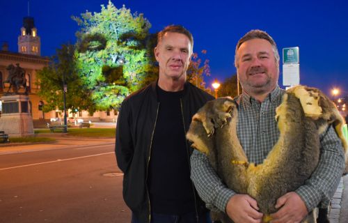 Artist Craig Walsh and Wadawurrung man Barry Gilson, with Barry's face projected onto a tree in Sturt Street..