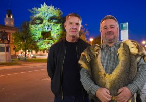 Artist Craig Walsh and Wadawurrung man Barry Gilson, with Barry's face projected onto a tree in Sturt Street..