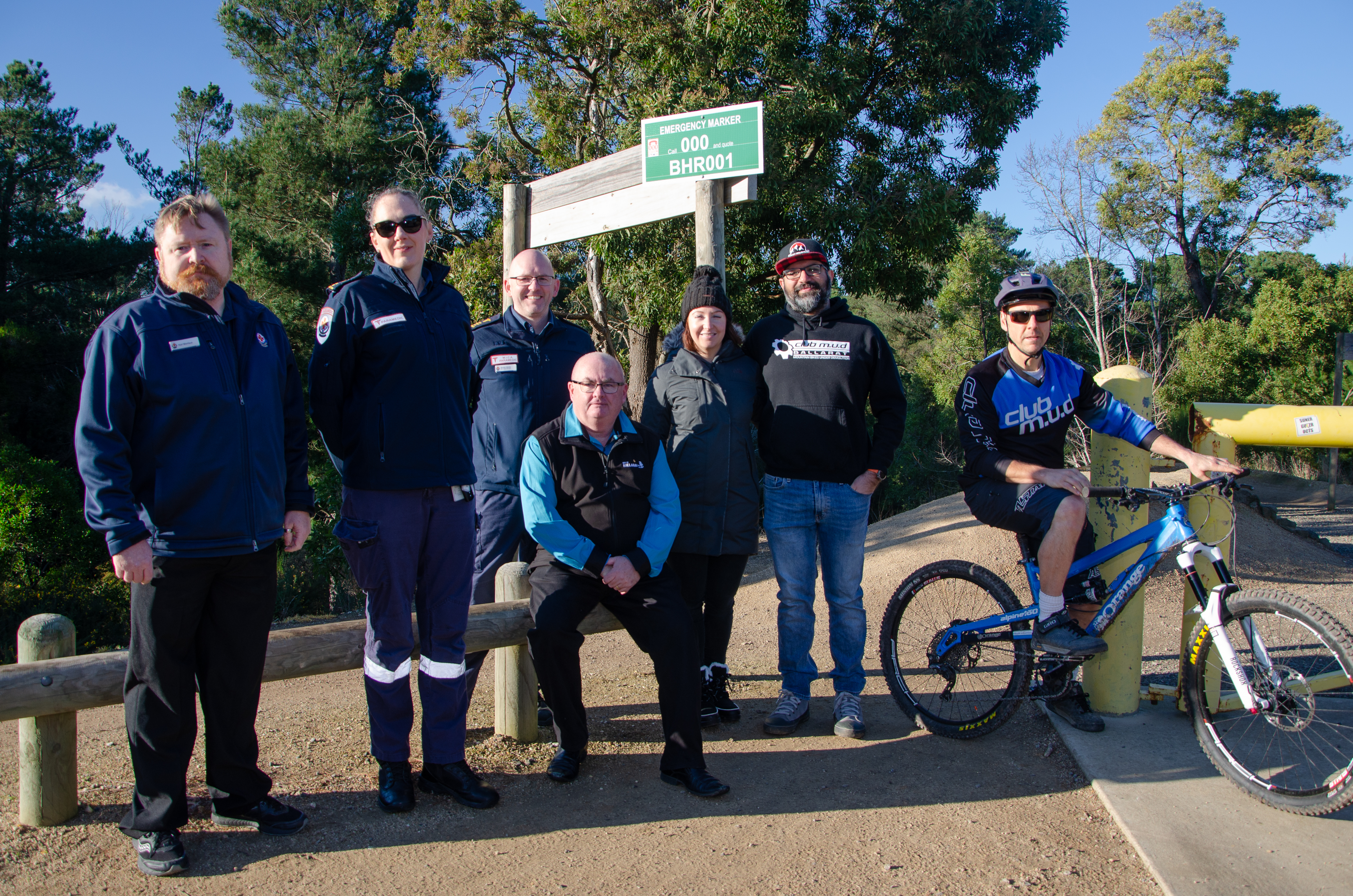 Cr Des Hudson with Ambulance Victoria and members of the mountain biking club