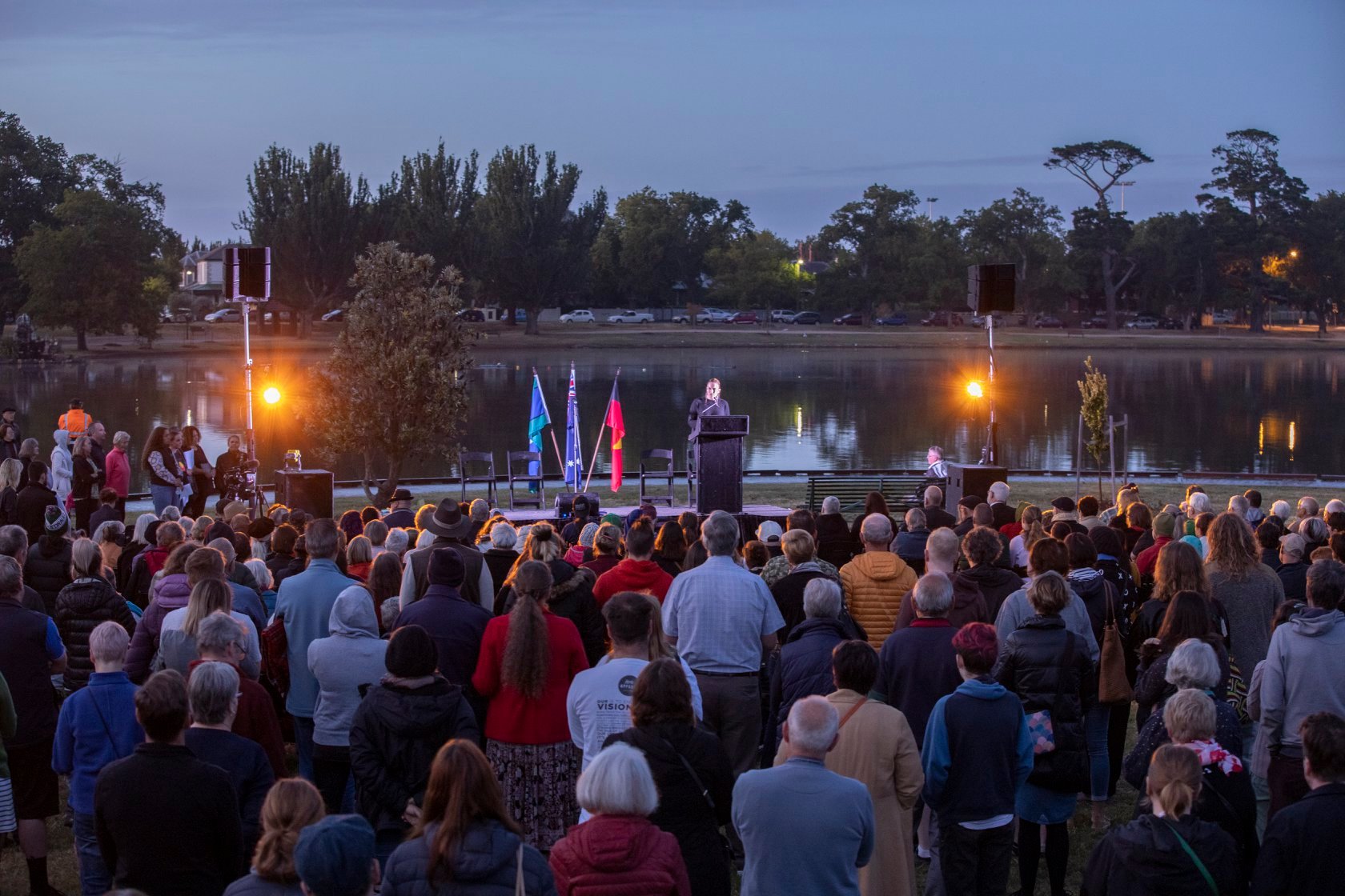Crowd gathers at Lake Wendouree at dawn for Survival Day Ceremony