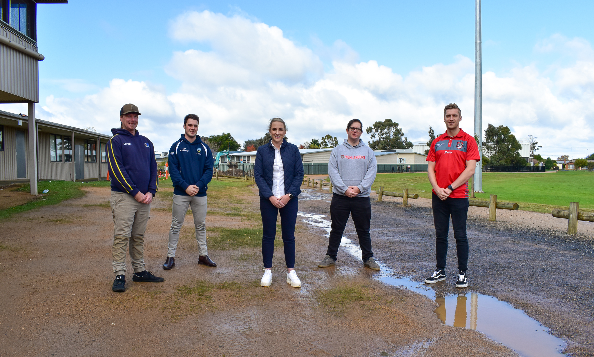 Cr Johnson with rugby and cricket club representatives