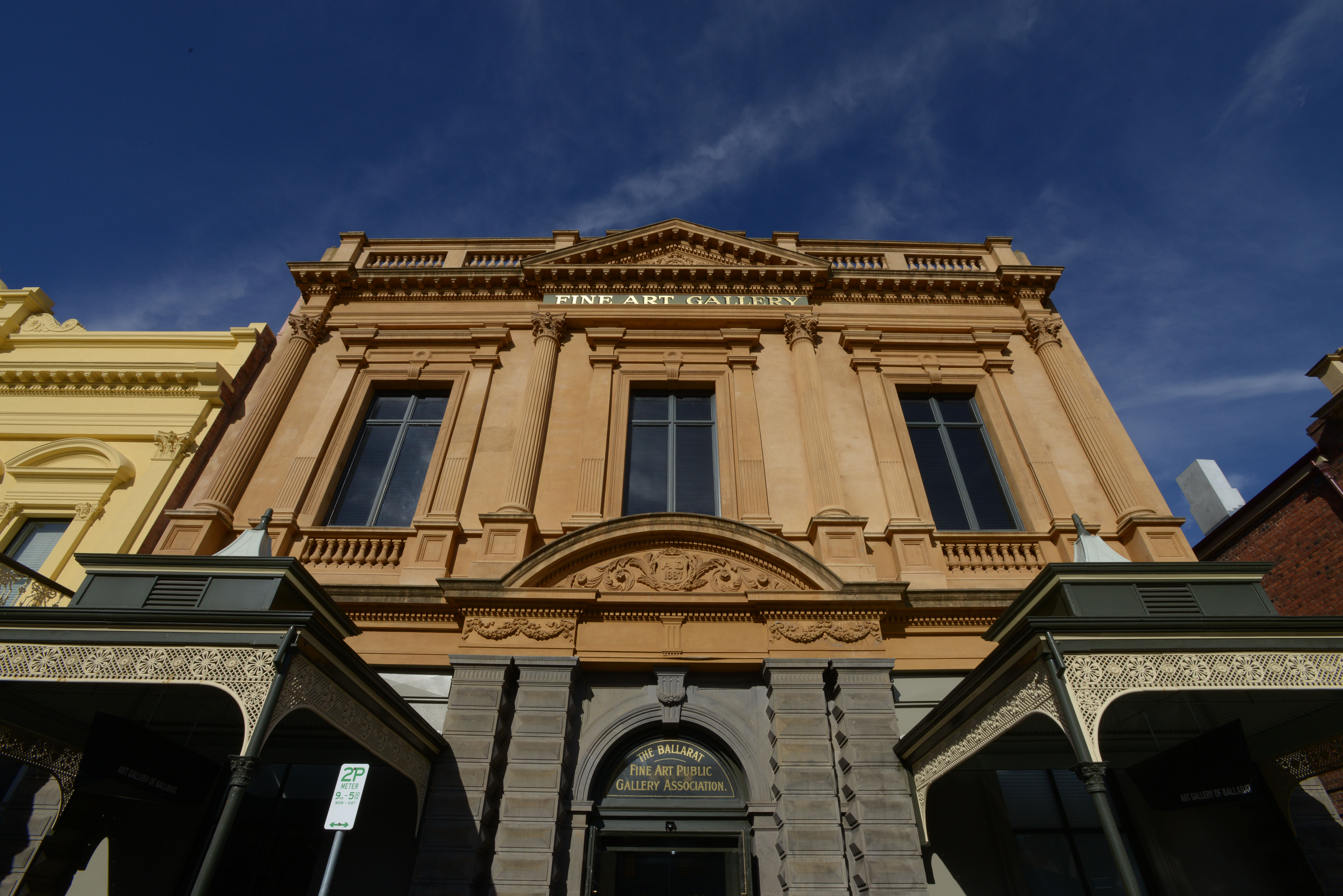 The front of the art gallery at a low angle