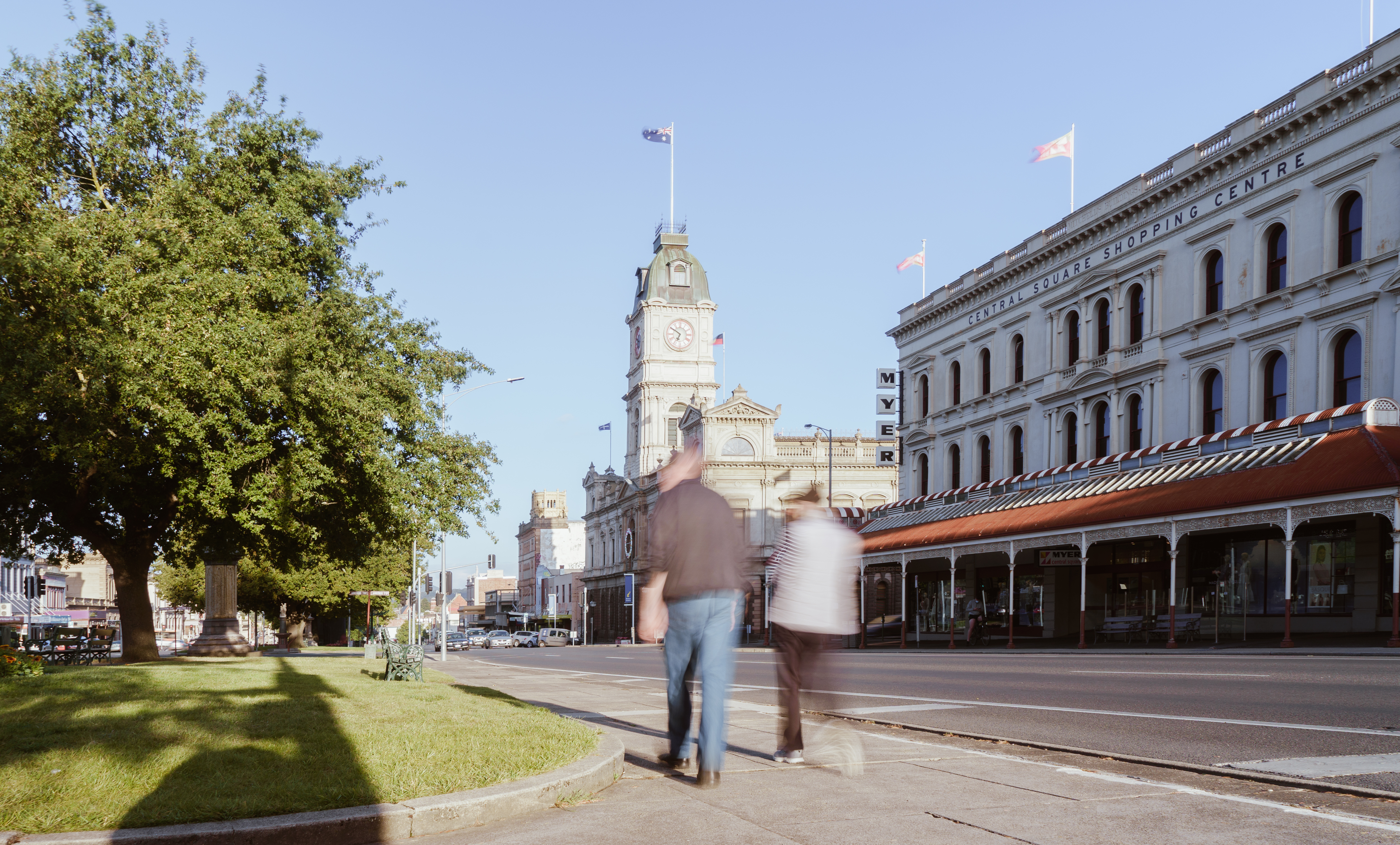 Couple walking down Sturt Street towards Town Hall in Ballarat