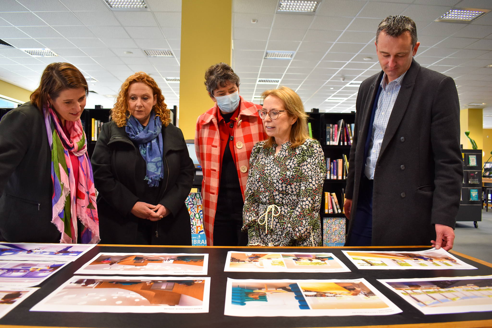 Mayor Daniel Moloney with Labor MPs and Ballarat Libraries Jenny Fink with new designs