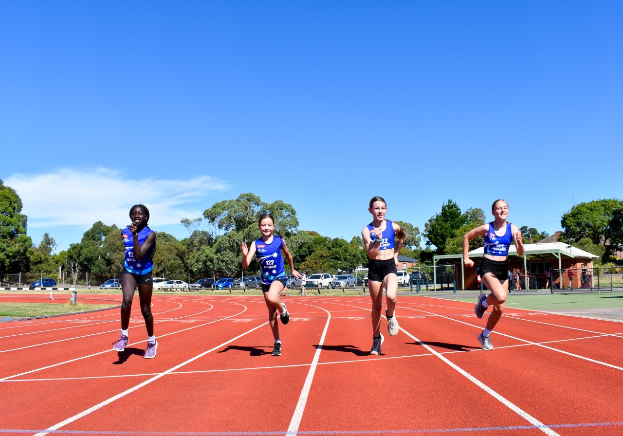 Little Athletics girls relay team.