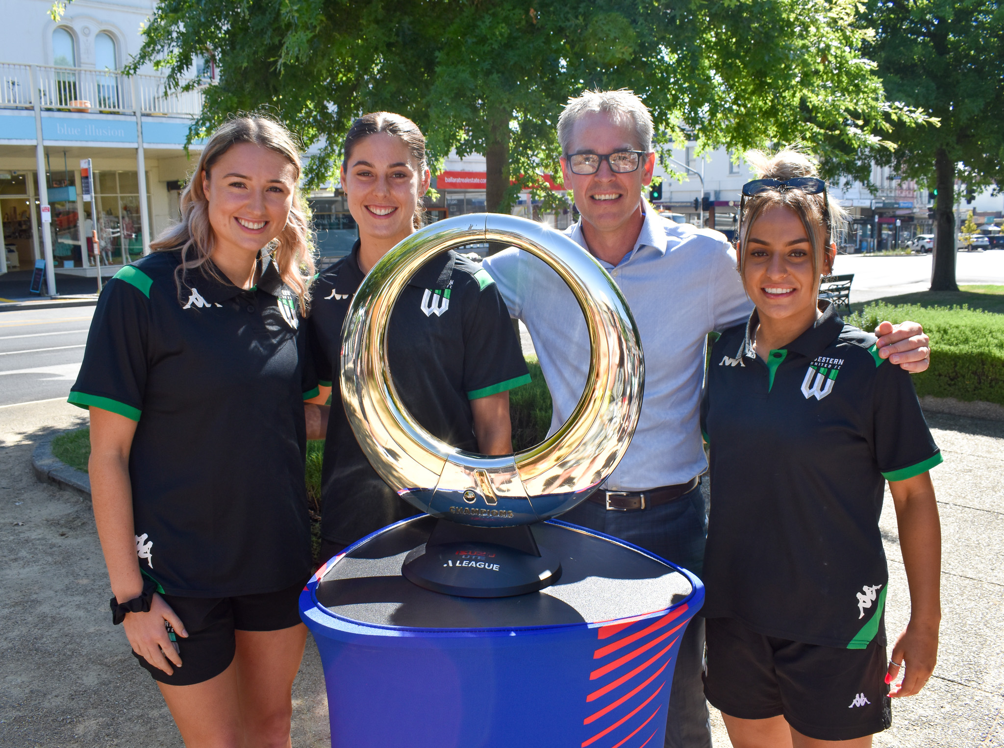 Cr Ben Taylor with Western United Women's players in January, 2023.