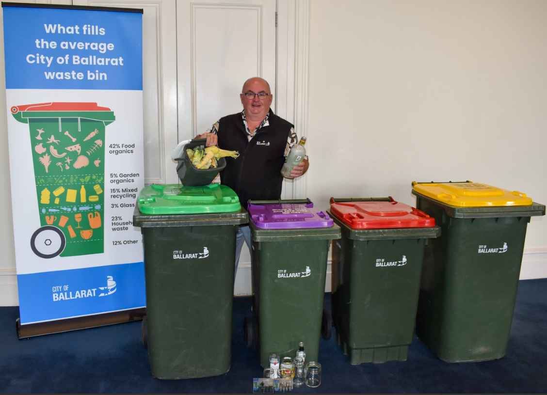 Mayor Cr Des Hudson with four kerbside bins