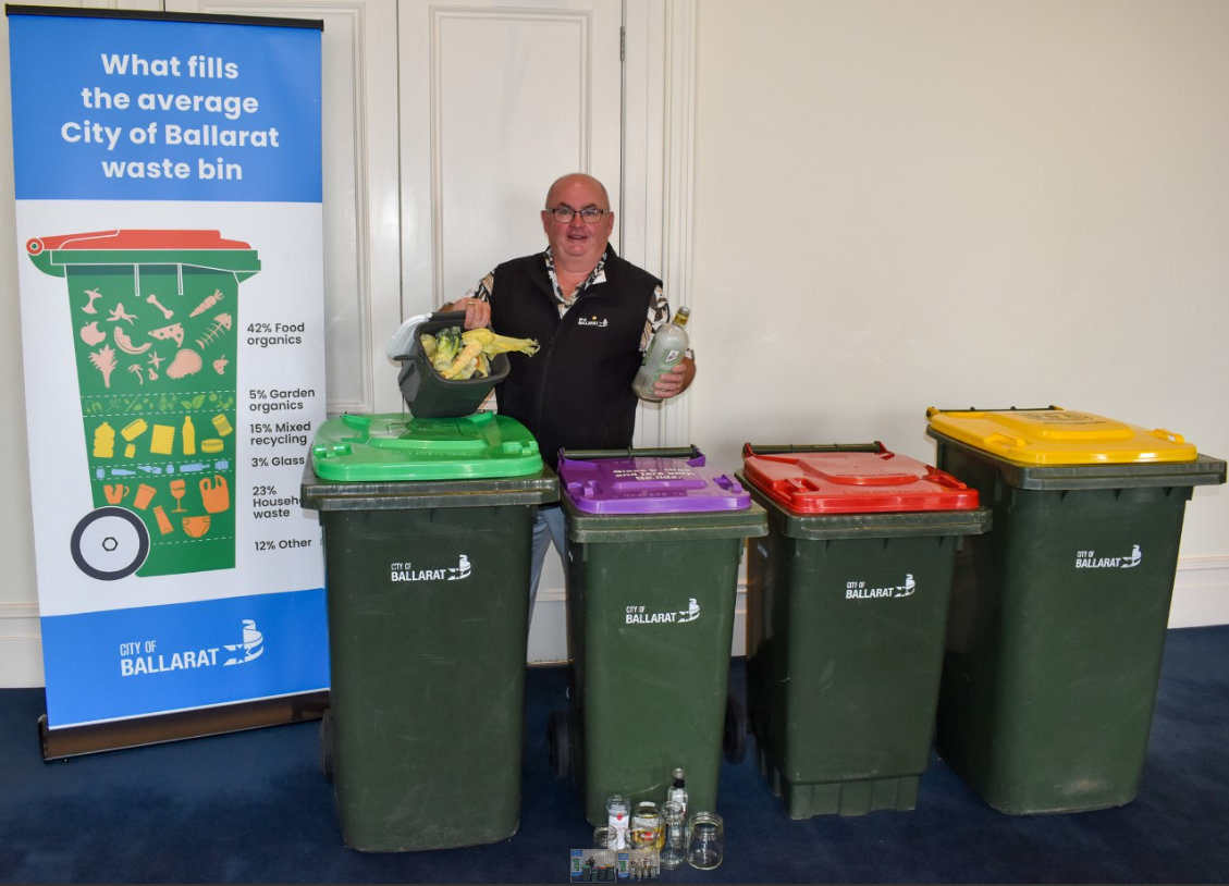 City of Ballarat Mayor Cr Des Hudson with four kerbside collection bins
