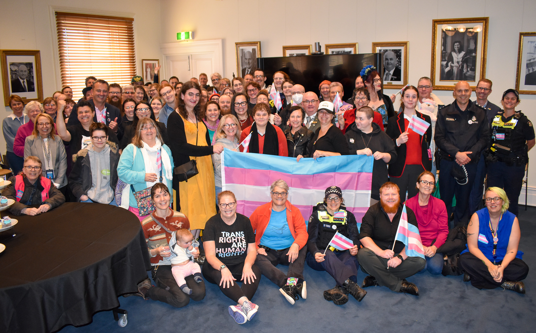 Mayor Des Hudson and community members and political representatives on Transgender Day of Visibility