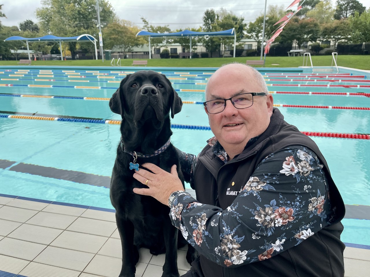 City of Ballarat Mayor, Cr Des Hudson with dog Neville at Eureka Pool