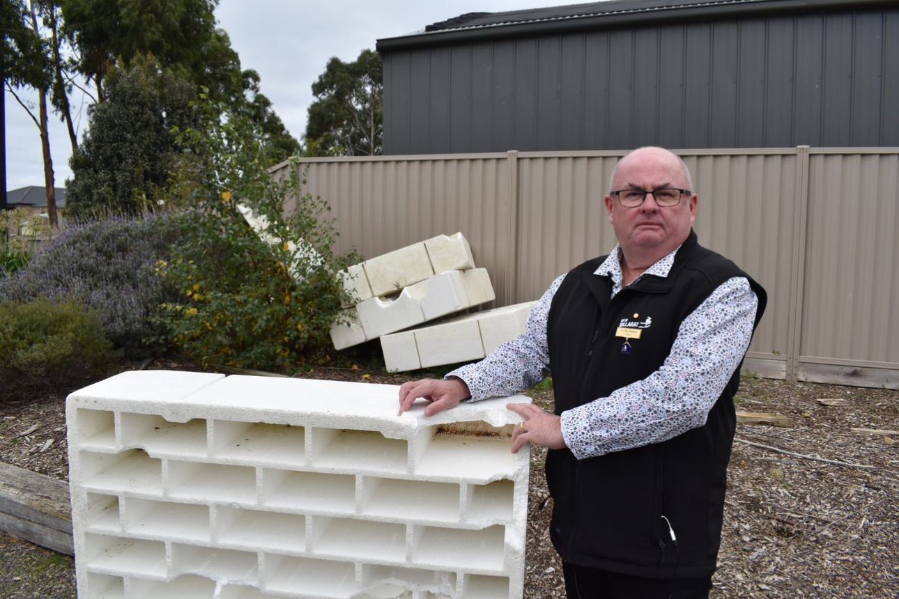 City of Ballarat Mayor Cr Des Hudson stands next to a stray waffle pod. 