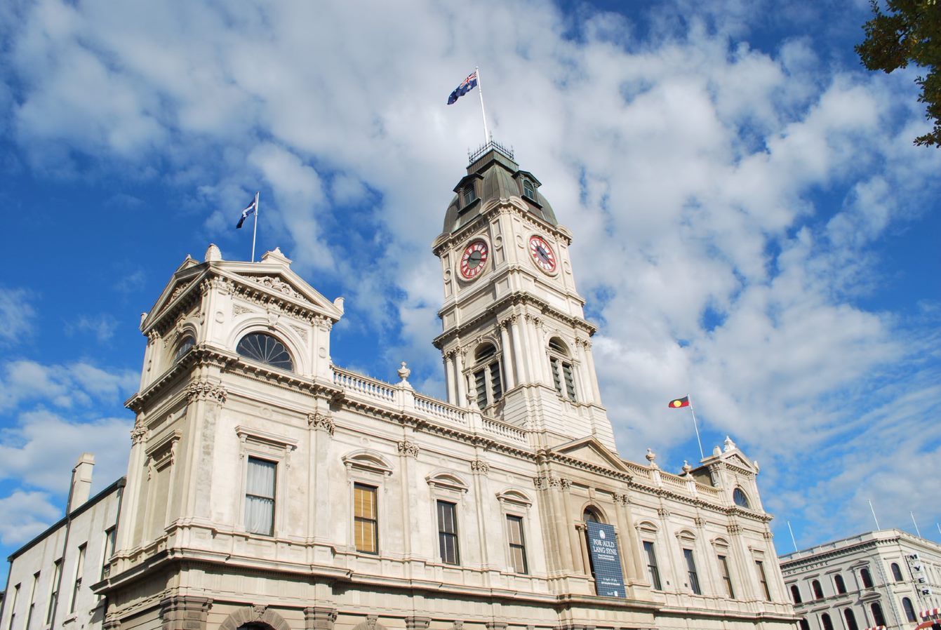 Ballarat Town Hall with a backdrop of a blue sky with some clouds. 