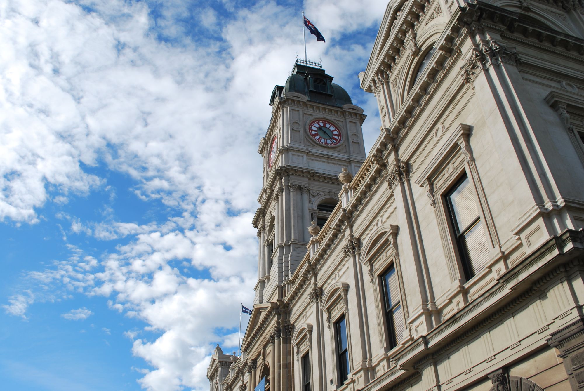 Generic image of Ballarat Town Hall facade, flag pole, blue skies