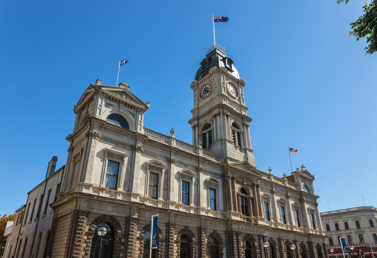 Ballarat Town Hall stands against a blue sky. 