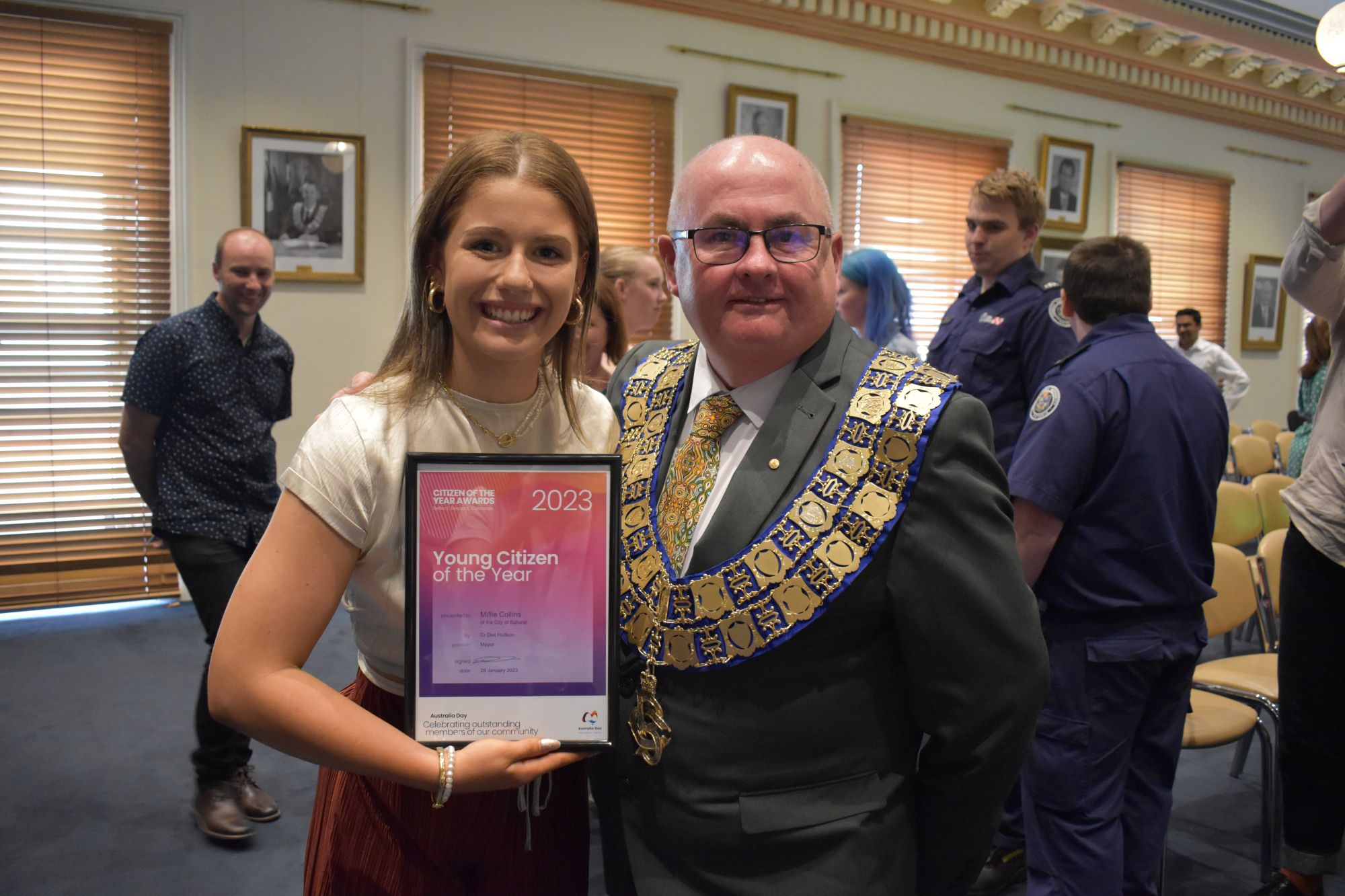 Photo of Mayor Cr Des Hudson with Young Citizen of the Year winner 2023 holding up a framed certificate