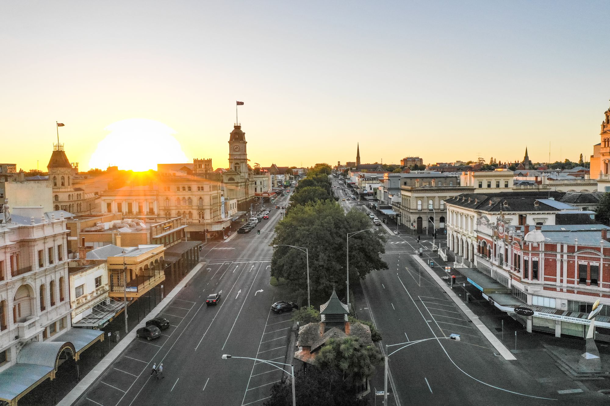 An aerial shot of Ballarat's central business district. In the centre there is a road with a trees in the middle and buildings on either side. 