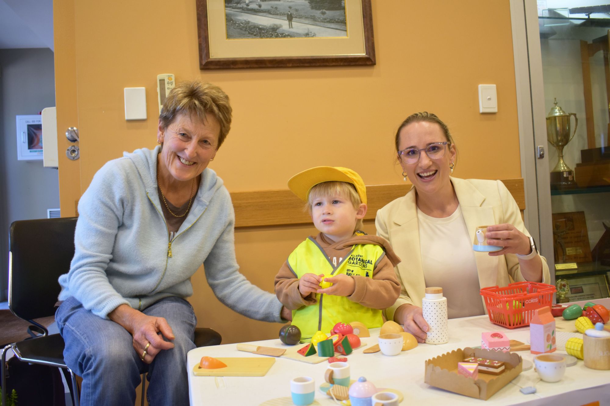 Cr Amy Johnson with grandpartent Jane and grandson Sonny as part of the Ageless Play Intergenerational Playgroup activity.