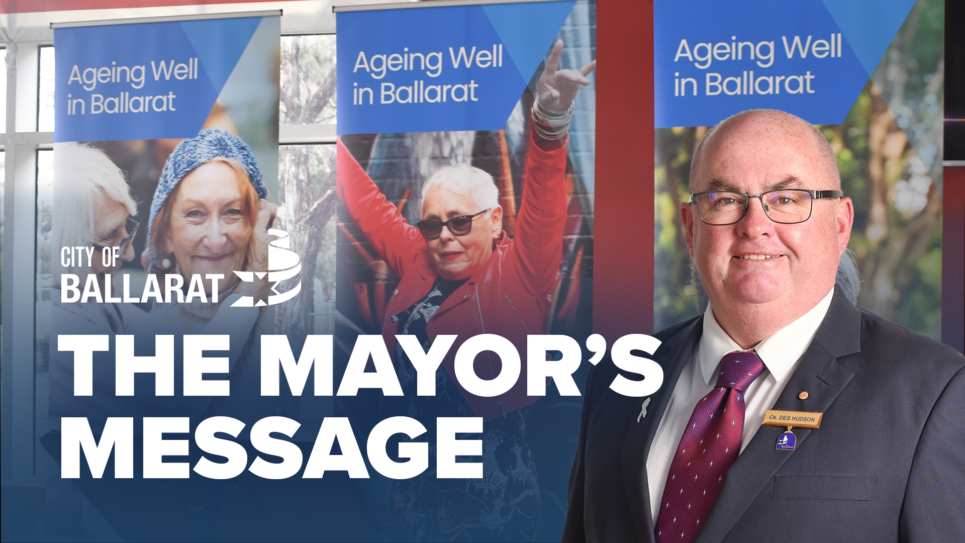 Text with The Mayor's Message with an image of Mayor Cr Des Hudson in front of Seniors Festival signage