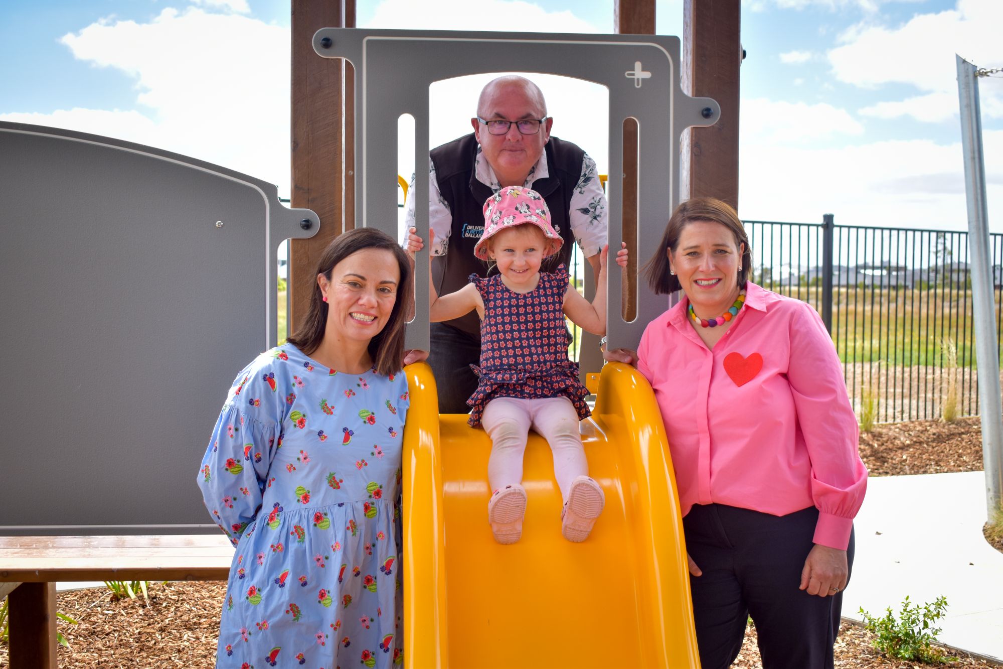 Minister for Children Lizzie Blandthorn, City of Ballarat Mayor Cr Des Hudson and Member for Wendouree Juliana Addison with Harlow at the opening of the new community hub and kindergarten in Alfredton.
