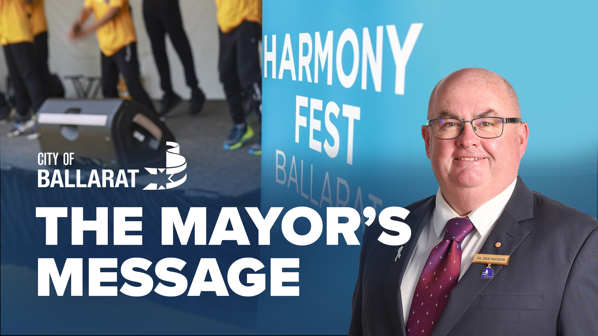 Text with The Mayor's Message with an image of Mayor Cr Des Hudson in front of the Harmony Fest stage