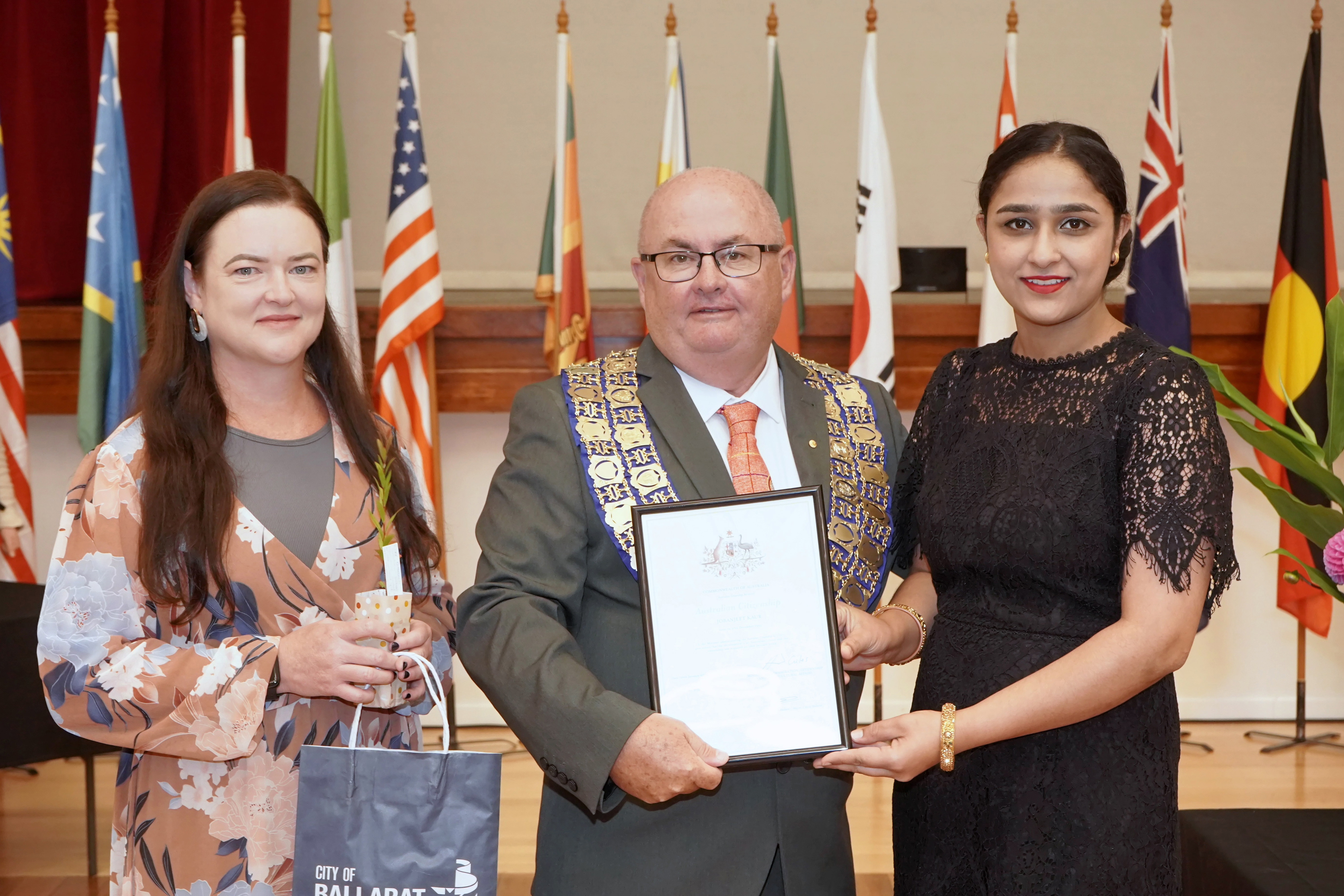 Cr Tracey Hargreaves, City of Ballarat Mayor Cr Des Hudson with new citizen. 