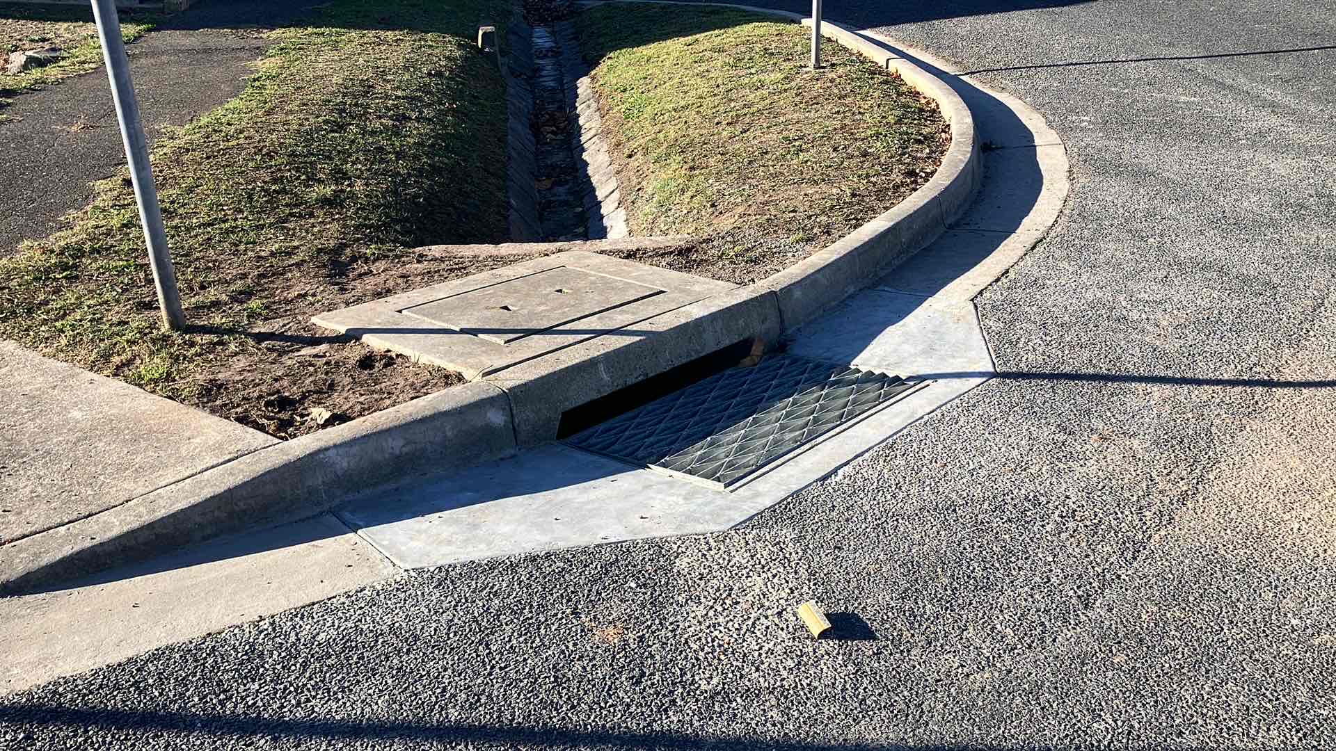 Bradshaw Street, Golden Point - Pit upgrade to include grated flume. - After the works were completed