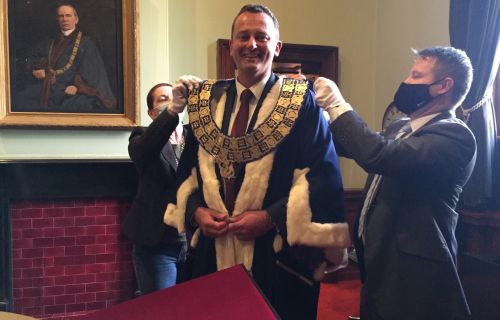 Cr Daniel Moloney is vested with the Mayoral chains