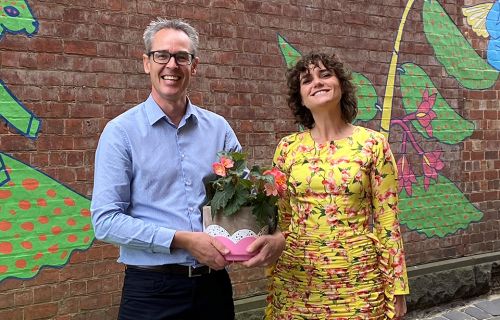 Cr Ben Taylor with Esther Olsson in the laneway