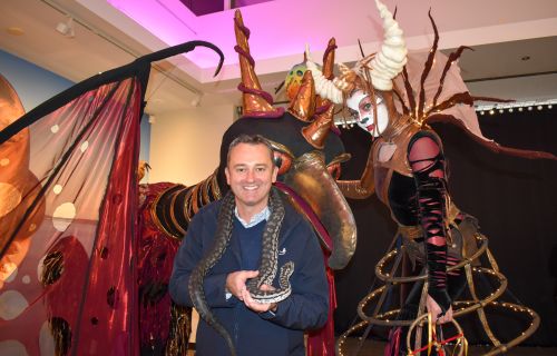 Ballarat Mayor Cr Daniel Moloney with Jeffrey the snake and Beyond Dark characters from Ballarat Winter Festival