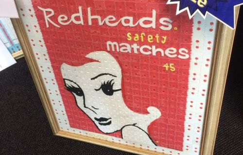 The winner of the 2018 open category - a framed image of the Redheads matches logo made from bread tags. 