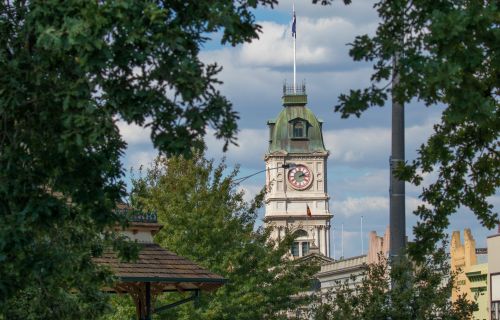 Generic photo of Town Hall in the distance with greenery