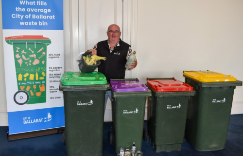 Mayor Cr Des Hudson with four kerbside bins