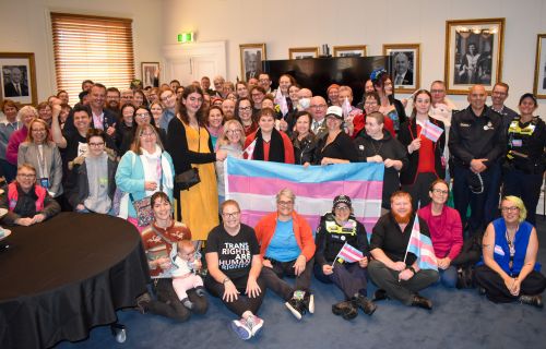 Mayor Des Hudson and community members and political representatives on Transgender Day of Visibility