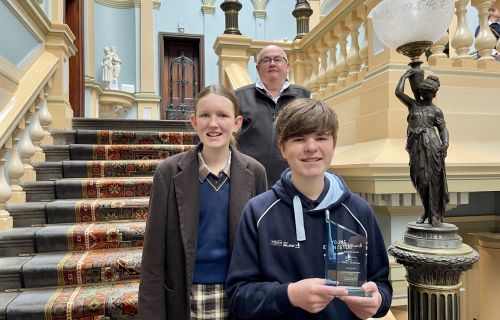 City of Ballarat Mayor, Cr Des Hudson with youth volunteers Shayla Cobbledick and Rohan McMaster