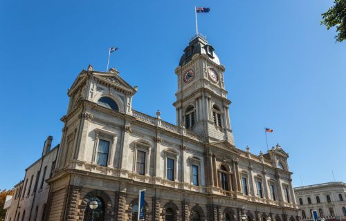 Ballarat Town Hall stands against a blue sky. 