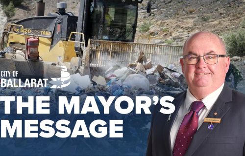 Text with The Mayor's Message with an image of Mayor Cr Des Hudson in front of a tip
