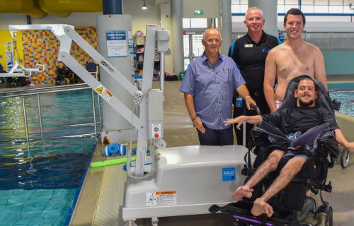 City of Ballarat Deputy Mayor, Cr Peter Eddy, Ballarat Aquatic and Lifestyle Centre manager Gerald Dixon, Pinarc Disability Support physiotherapist Isaac Hanneysee and the first user of the new hoist Lucas.