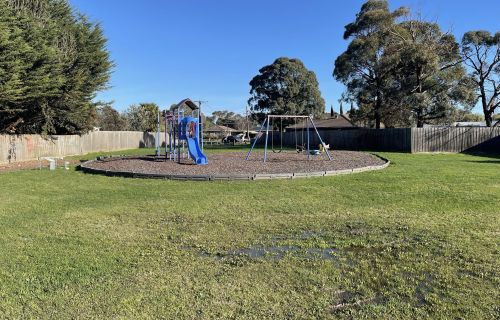 Image of slides and swings at Kowree Crescent Park, Sebastopol