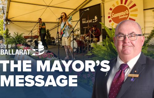 Text with The Mayor's Message with an image of Mayor Cr Des Hudson in front of the Summer Sunday's event