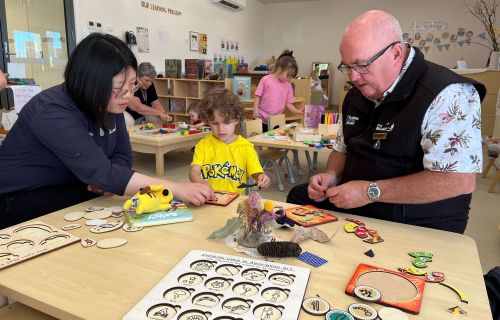 City of Ballarat Mayor, Cr Des Hudson (right) works on a puzzle with Heidi and City of Ballarat Early Childhood Teacher, Karen Li at Rowan View Children’s Centre.