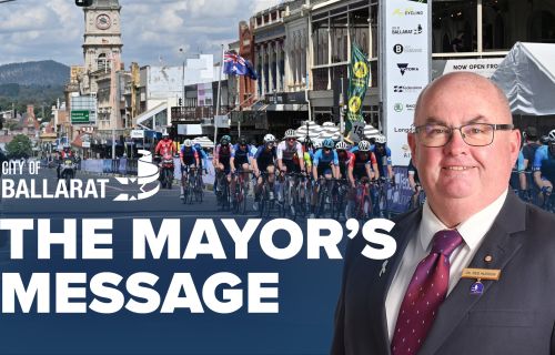Text with The Mayor's Message with an image of Mayor Cr Des Hudson in front of the AusCycling Road National Championships