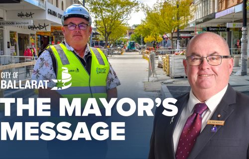 Text with The Mayor's Message with an image of Mayor Cr Des Hudson in front of the ongoing Bridge Mall redevelopment