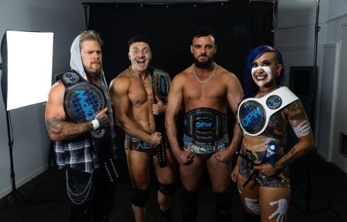 Four wrestlers posing