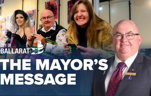 Text with The Mayor's Message with an image of Mayor Cr Des Hudson in front of the Ballarat Pride Month program launch