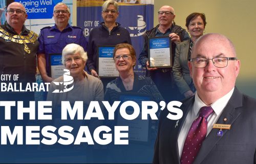 Text with The Mayor's Message with an image of Mayor Cr Des Hudson in front of the 2023 Seniors Awards winners