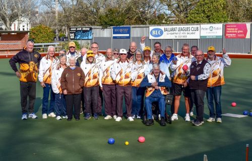 Members of the City Oval Bowling Club with City of Ballarat Mayor, Cr Des Hudson celebrating the official opening of new synthetic green.