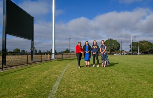In front of the new scoreboard is (L-R) Member for Wendouree, Juliana Addison, Napoleons-Sebastopol Cricket Club President, Danielle Riding, Sebastopol Football and Netball Club President, Chenay Wilkinson and City of Ballarat Mayor, Cr Tracey Hargreaves.