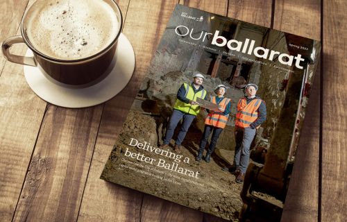 ourballarat magazine next to a coffee on a table