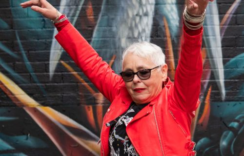 woman in a red leather jacket 