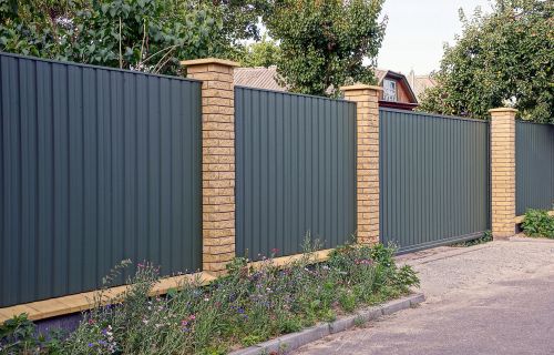 Brick and metal fence